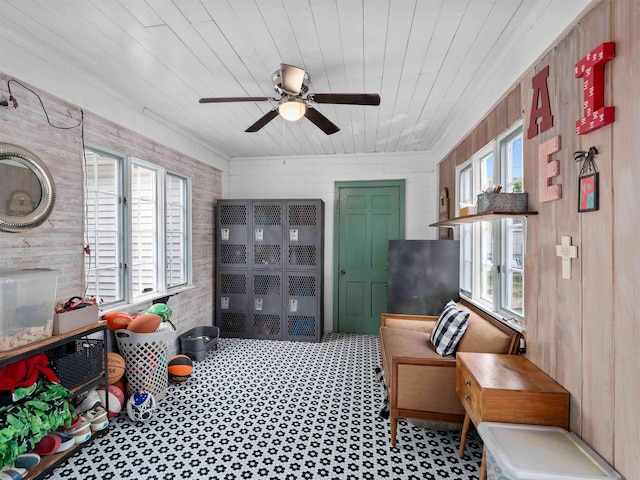 2728 E Dr, Fort Wayne, IN 46805 - sitting room with wood ceiling, wood walls, plenty of natural light, and ceiling fan