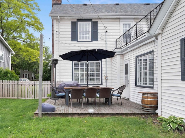 2728 E Dr, Fort Wayne, IN 46805 - rear view of property featuring a chimney, a wooden deck, a balcony, and a shingled roof