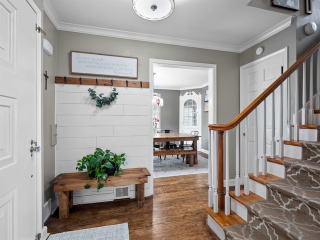 2728 E Dr, Fort Wayne, IN 46805 - entryway with ornamental molding, stairway, wood finished floors, and baseboards