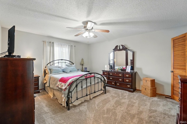 8427 Victoria Woods Pl, Fort Wayne, IN 46825 - carpeted bedroom with ceiling fan and a textured ceiling