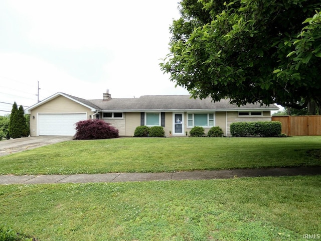 105 Shawnee Dr, Bedford, IN 47421 - ranch-style home featuring an attached garage, concrete driveway, and a chimney