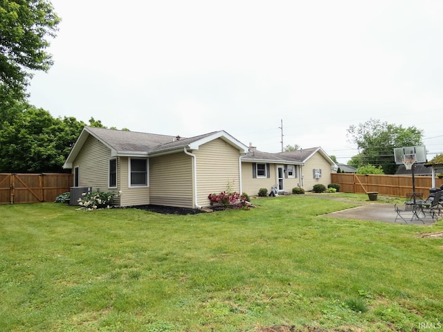 105 Shawnee Dr, Bedford, IN 47421 - rear view of house featuring a patio and central air condition unit