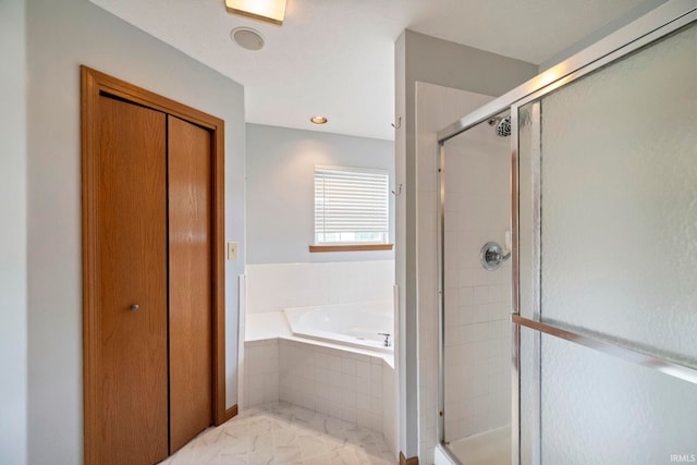 1544 Shining Armor Ln, West Lafayette, IN 47906 - full bath with a garden tub, a shower stall, and marble finish floors
