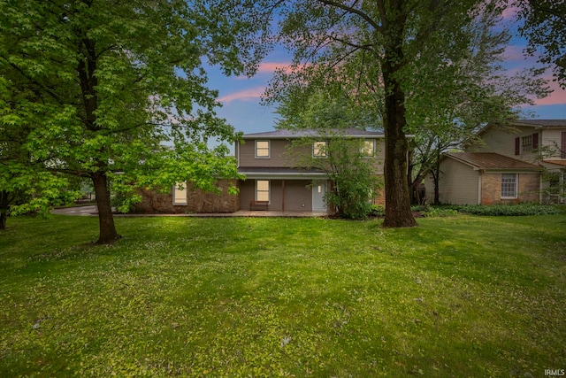 2213 Old Oak Dr, West Lafayette, IN 47906 - yard at dusk with a lawn