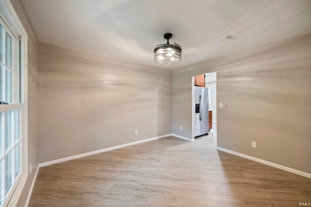2213 Old Oak Dr, West Lafayette, IN 47906 - spare room featuring baseboards and light wood finished floors