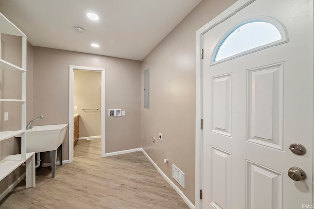 2213 Old Oak Dr, West Lafayette, IN 47906 - washroom featuring electric dryer hookup, baseboards, light wood-type flooring, and recessed lighting