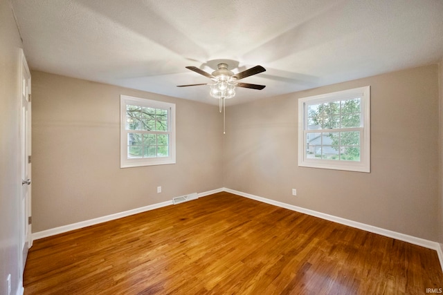 2213 Old Oak Dr, West Lafayette, IN 47906 - unfurnished room with wood finished floors, baseboards, and ceiling fan
