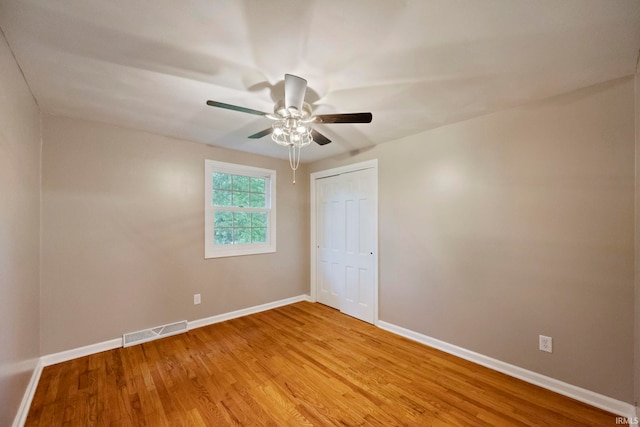 2213 Old Oak Dr, West Lafayette, IN 47906 - unfurnished room with light wood-style flooring, baseboards, and ceiling fan