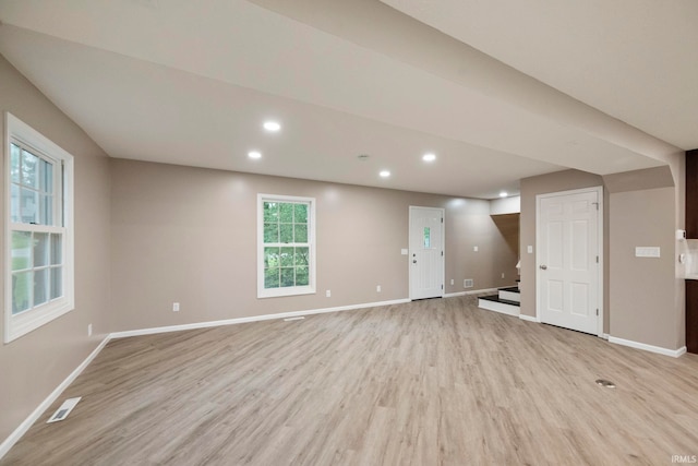 2213 Old Oak Dr, West Lafayette, IN 47906 - unfurnished living room featuring light wood finished floors, baseboards, recessed lighting, and stairs