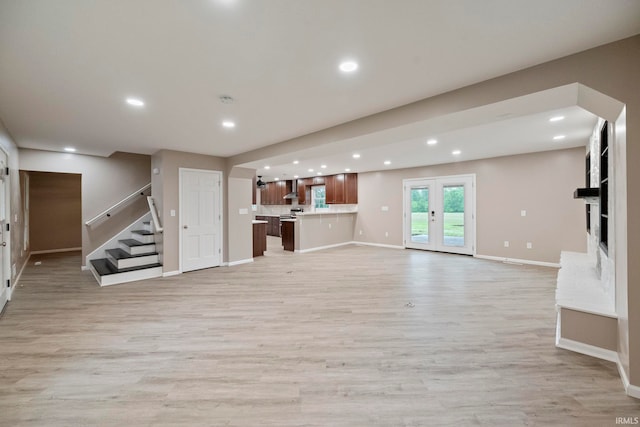 2213 Old Oak Dr, West Lafayette, IN 47906 - unfurnished living room with light wood-type flooring, stairway, baseboards, recessed lighting, and a fireplace