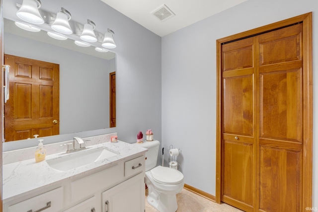 5531 Gate Tree Ln, Fort Wayne, IN 46835 - bathroom with vanity, toilet, and tile patterned floors
