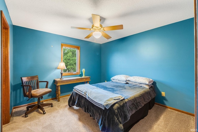 5531 Gate Tree Ln, Fort Wayne, IN 46835 - carpeted bedroom with baseboards, ceiling fan, and a textured ceiling