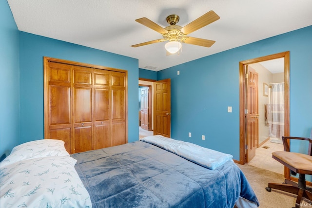5531 Gate Tree Ln, Fort Wayne, IN 46835 - bedroom with light colored carpet, a closet, ceiling fan, and ensuite bathroom