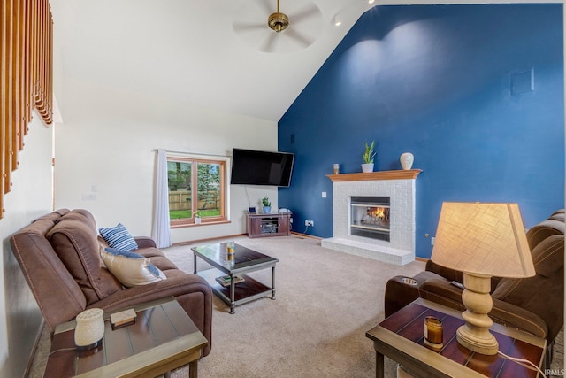 5531 Gate Tree Ln, Fort Wayne, IN 46835 - living room featuring high vaulted ceiling, a ceiling fan, carpet floors, baseboards, and a brick fireplace