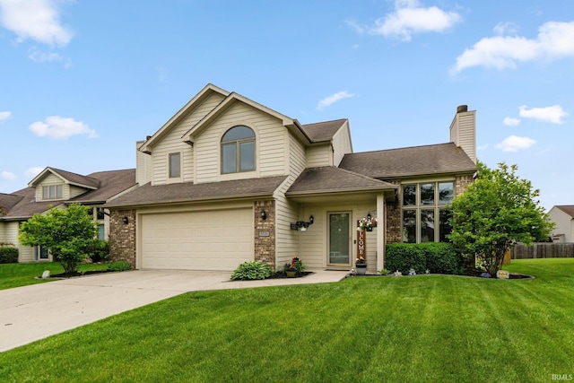 5531 Gate Tree Ln, Fort Wayne, IN 46835 - view of front of home featuring brick siding, a garage, driveway, and a chimney
