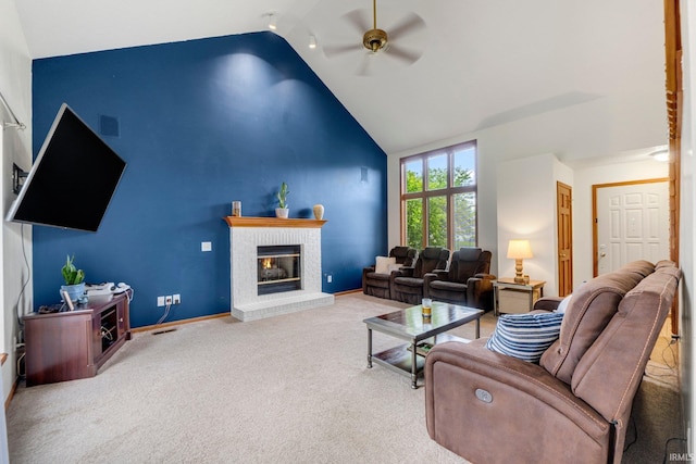 5531 Gate Tree Ln, Fort Wayne, IN 46835 - carpeted living room featuring ceiling fan, a fireplace, high vaulted ceiling, and baseboards