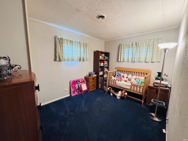 1005 Elm St, Plymouth, IN 46563 - bedroom with carpet and a textured ceiling
