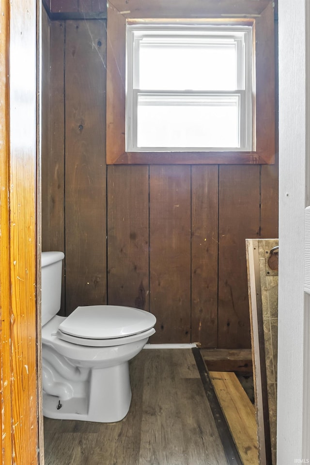 2121 Parnell Ave, Fort Wayne, IN 46805 - half bathroom featuring toilet, wood finished floors, and plenty of natural light