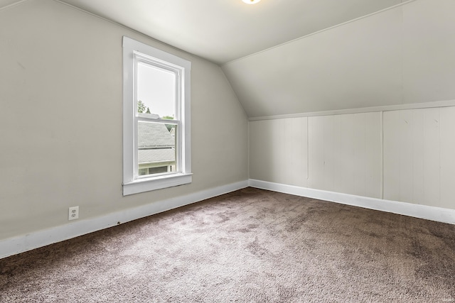 2121 Parnell Ave, Fort Wayne, IN 46805 - additional living space featuring vaulted ceiling, carpet, and baseboards