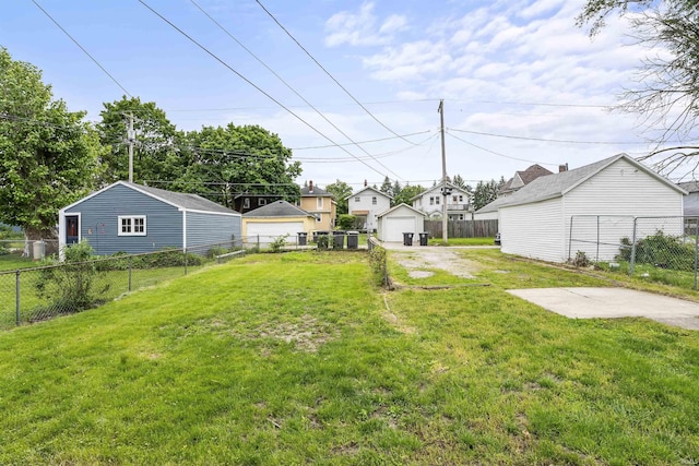 2121 Parnell Ave, Fort Wayne, IN 46805 - view of yard featuring a garage and a residential view