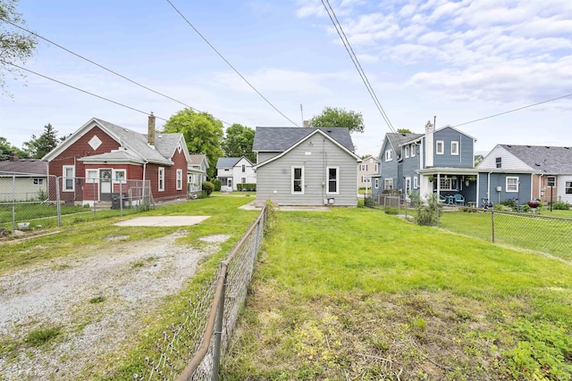 2121 Parnell Ave, Fort Wayne, IN 46805 - back of house featuring a residential view and a fenced backyard