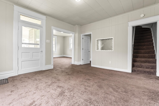 2121 Parnell Ave, Fort Wayne, IN 46805 - carpeted spare room featuring crown molding, stairs, and baseboards
