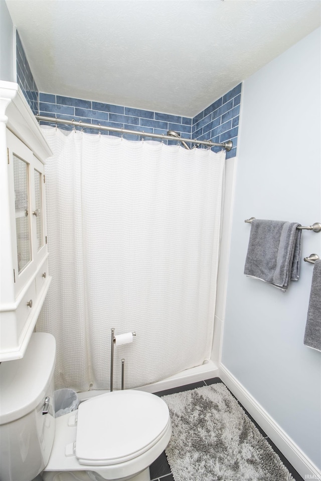 917 E Mill Creek Rd, Greensburg, IN 47240 - bathroom with toilet and a shower with curtain