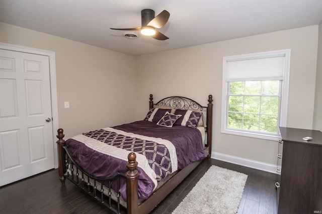 917 E Mill Creek Rd, Greensburg, IN 47240 - bedroom featuring dark wood-style floors, baseboards, and ceiling fan