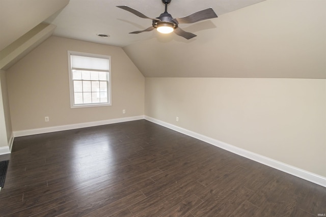 917 E Mill Creek Rd, Greensburg, IN 47240 - additional living space with ceiling fan, dark wood finished floors, lofted ceiling, and baseboards