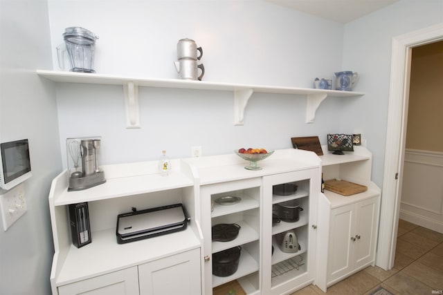 917 E Mill Creek Rd, Greensburg, IN 47240 - kitchen with open shelves, light tile patterned flooring, and light countertops
