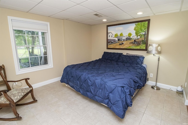 917 E Mill Creek Rd, Greensburg, IN 47240 - bedroom featuring a paneled ceiling, baseboards, light tile patterned floors, and recessed lighting