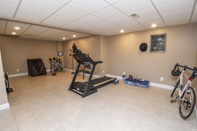 917 E Mill Creek Rd, Greensburg, IN 47240 - exercise room with recessed lighting, a paneled ceiling, baseboards, and light tile patterned floors