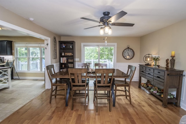 917 E Mill Creek Rd, Greensburg, IN 47240 - dining area with a ceiling fan, plenty of natural light, light wood finished floors, and wainscoting