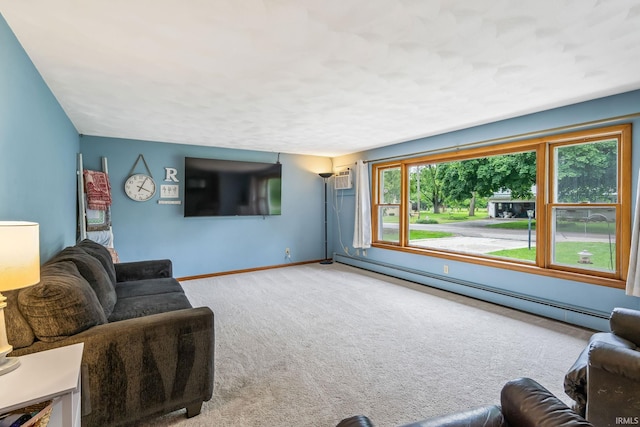 907 N Orchard Dr, North Manchester, IN 46962 - living area with carpet, a baseboard heating unit, a wall mounted air conditioner, and baseboards