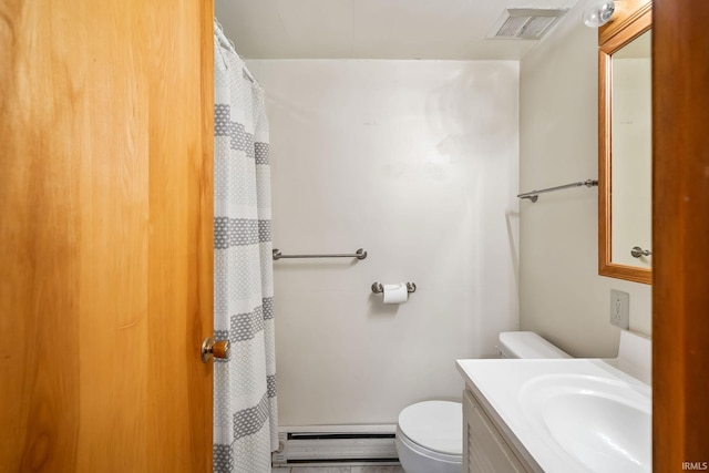 907 N Orchard Dr, North Manchester, IN 46962 - full bath with a baseboard radiator, toilet, vanity, and curtained shower
