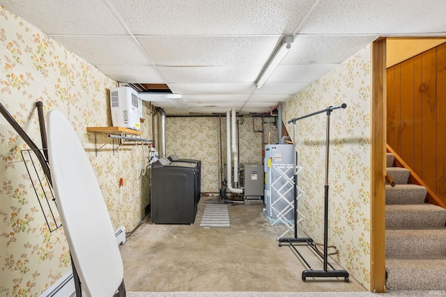 907 N Orchard Dr, North Manchester, IN 46962 - finished basement featuring wallpapered walls, washer / dryer, gas water heater, a paneled ceiling, and stairs