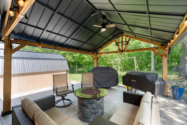 3705 E Forest Glen Ave, Leesburg, IN 46538 - view of patio featuring ceiling fan, a grill, and an outdoor living space