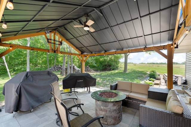 3705 E Forest Glen Ave, Leesburg, IN 46538 - view of patio / terrace featuring an outdoor living space with a fire pit, a grill, and a gazebo
