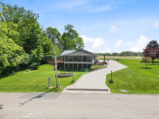 3705 E Forest Glen Ave, Leesburg, IN 46538 - view of front of house with a front lawn and a deck