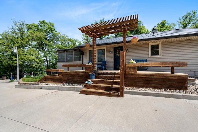 3705 E Forest Glen Ave, Leesburg, IN 46538 - view of front of property featuring a standing seam roof, a porch, metal roof, and a pergola