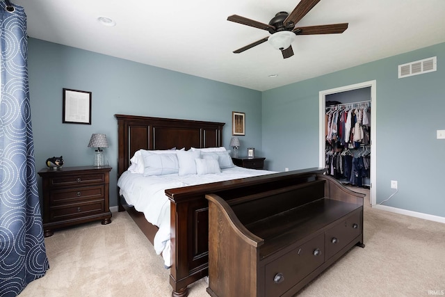 1154 S Deer Run, Ellettsville, IN 47429 - bedroom featuring light carpet, baseboards, a ceiling fan, a spacious closet, and a closet