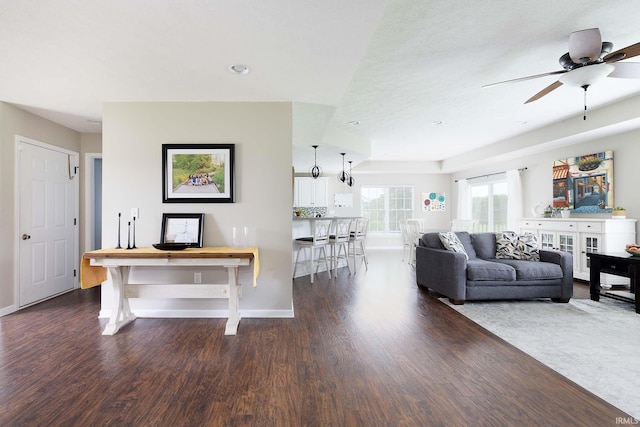 1154 S Deer Run, Ellettsville, IN 47429 - living area with dark wood-style flooring, baseboards, a ceiling fan, and recessed lighting