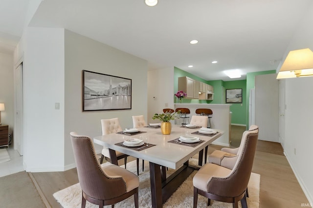 5248 Coventry Ln, Fort Wayne, IN 46804 - dining room featuring light wood finished floors, baseboards, and recessed lighting