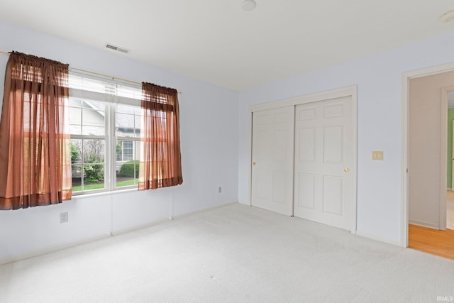 5248 Coventry Ln, Fort Wayne, IN 46804 - unfurnished bedroom with light carpet, a closet, and baseboards
