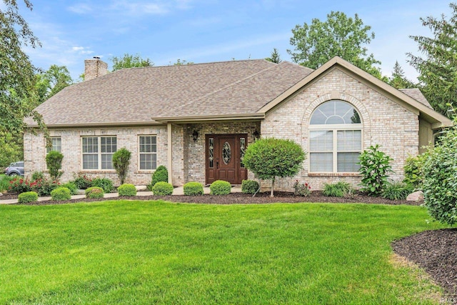 5248 Coventry Ln, Fort Wayne, IN 46804 - view of front of property with brick siding, a chimney, a front lawn, and roof with shingles