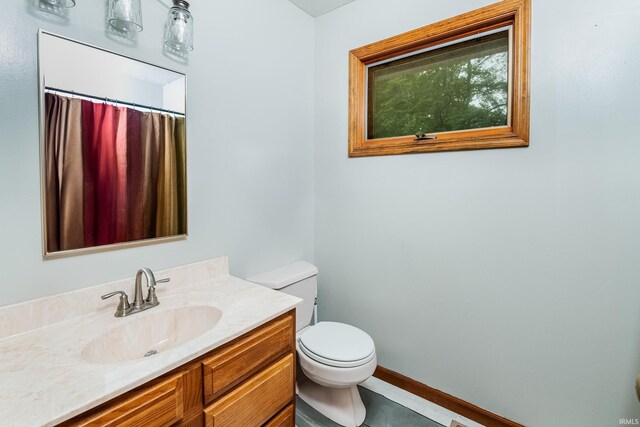 4641 W Harvest Ln, Bloomington, IN 47404 - full bath with toilet, vanity, and a shower with shower curtain