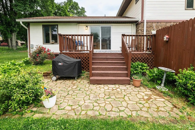 4641 W Harvest Ln, Bloomington, IN 47404 - rear view of house with a wooden deck and a patio area