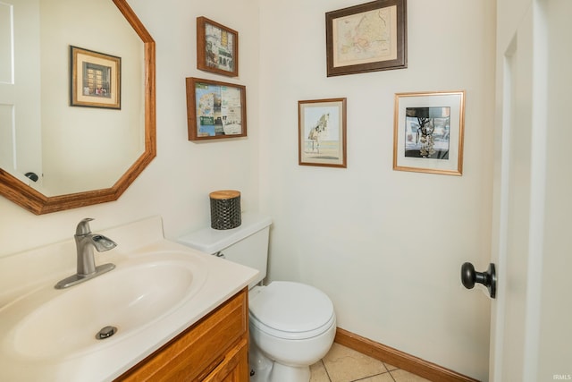 4641 W Harvest Ln, Bloomington, IN 47404 - half bath with toilet, vanity, tile patterned flooring, and baseboards