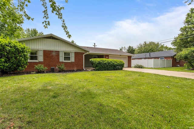 1105 E Southway Blvd, Kokomo, IN 46902 - ranch-style home featuring brick siding, concrete driveway, a garage, central air condition unit, and board and batten siding