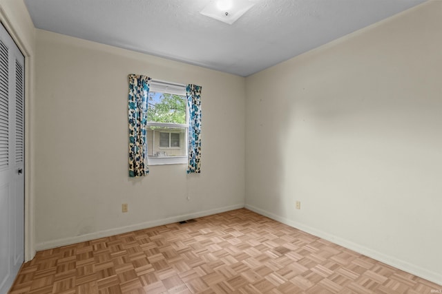 1105 E Southway Blvd, Kokomo, IN 46902 - empty room with baseboards and a textured ceiling